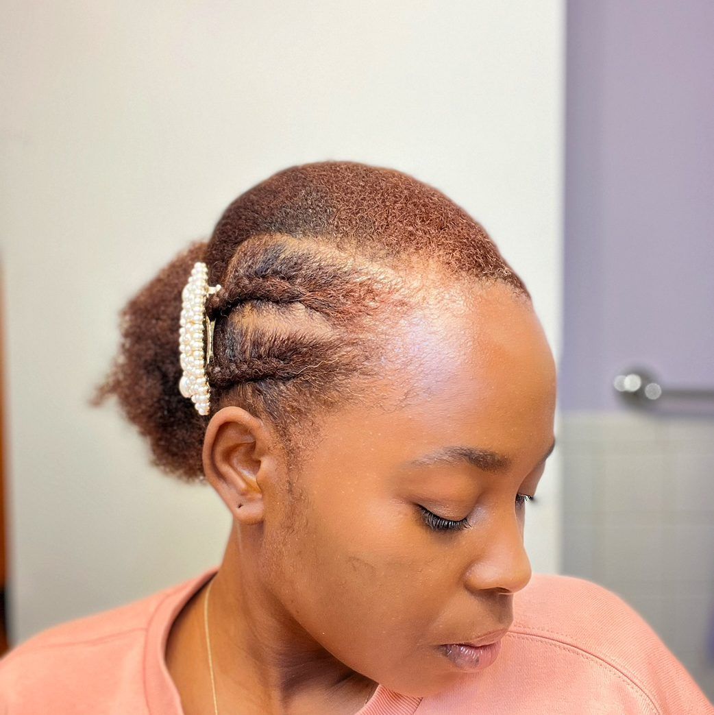 Side braided low puff.